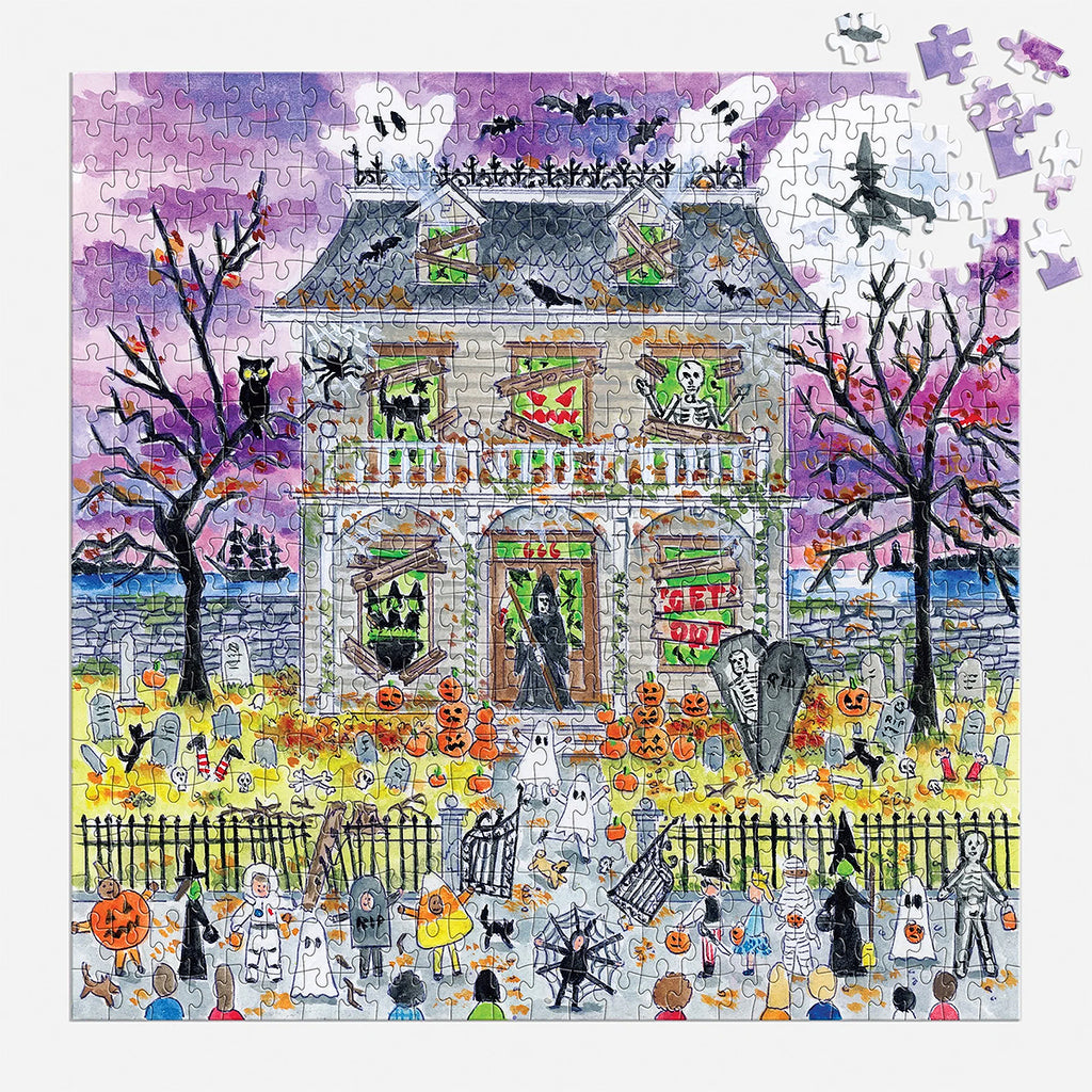 Halloween-themed puzzle with a haunted house and various Halloween elements.