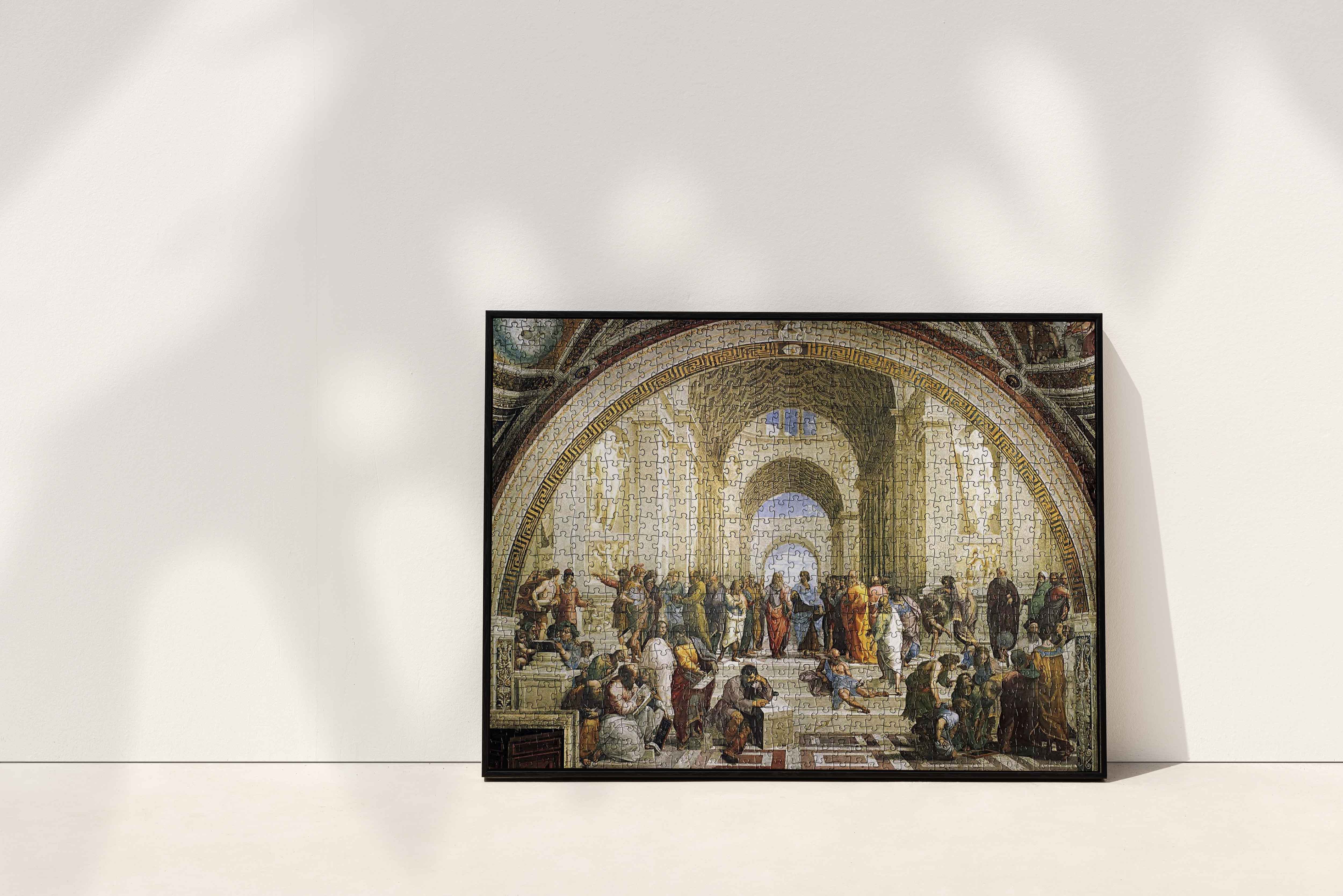 Unleash your inner puzzle master with the 1000-piece Raphael The School of Athens Jigsaw Puzzle - a beautiful masterpiece from the world of fine art.