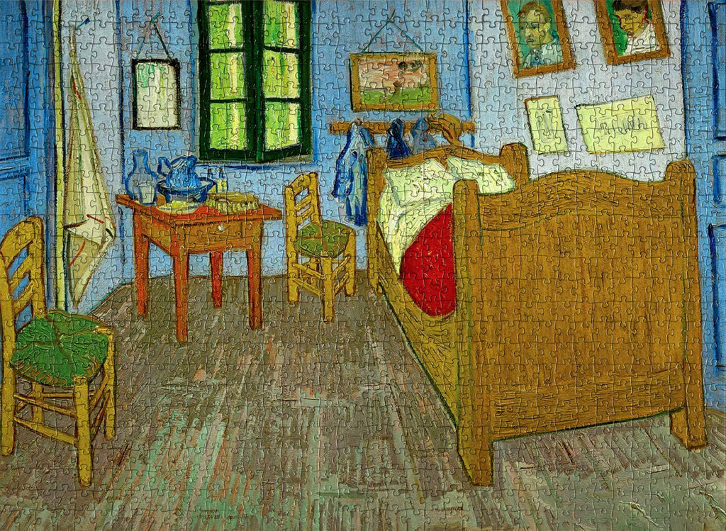A completed jigsaw puzzle depicting Vincent Van Gogh's 'Bedroom In Arles' painting, showcasing vibrant colours and intricate details.