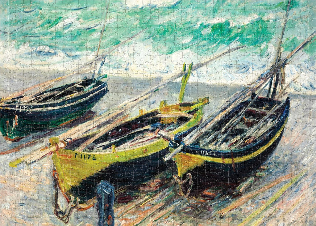 1000-piece Claude Monet Three Fishing Boats jigsaw puzzle in elegant round cardboard packaging showing Impressionist artwork of yellow and blue boats on turbulent sea