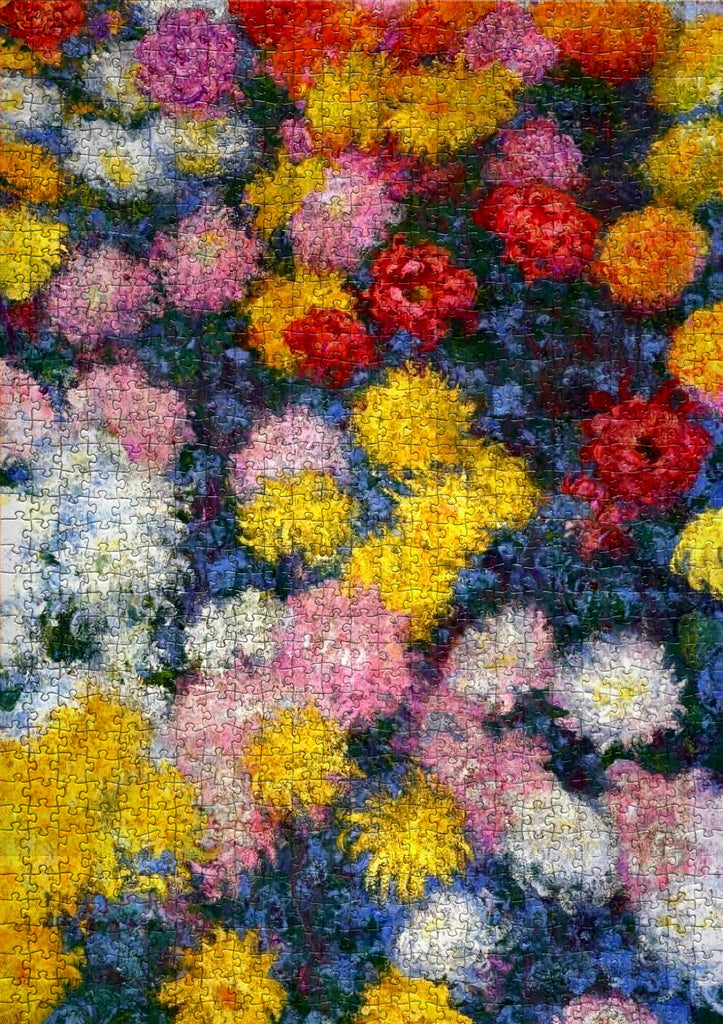 Completed 1000-piece Claude Monet art jigsaw puzzle featuring colourful chrysanthemums from Giverny garden