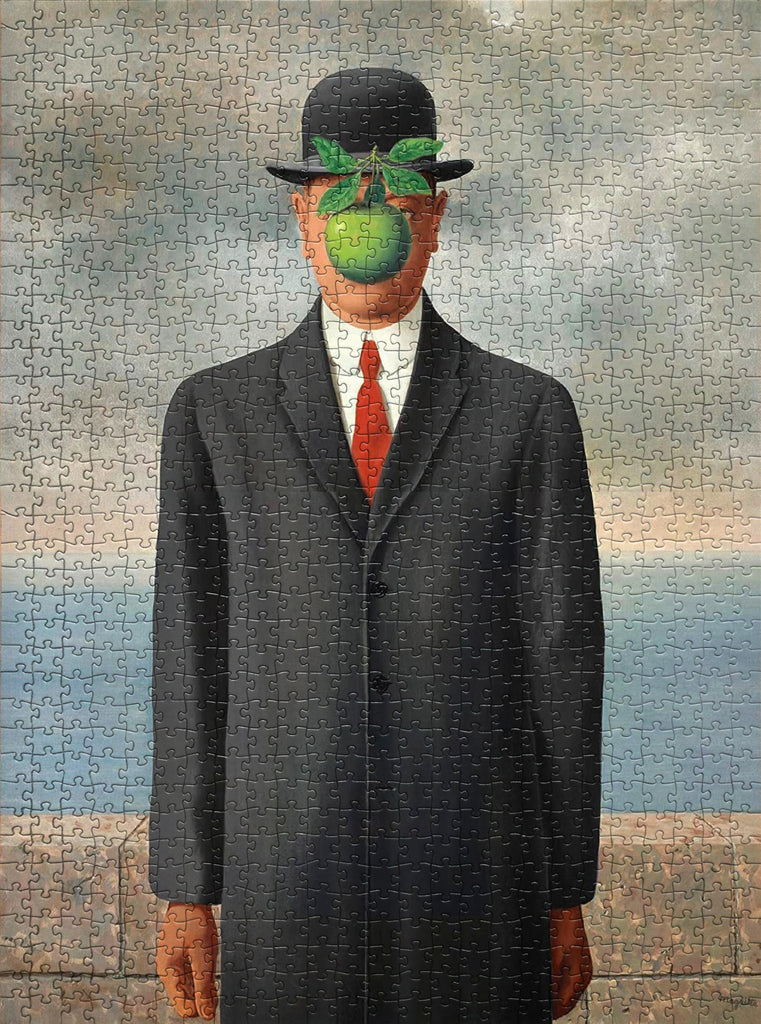 Eurographics fine art jigsaw puzzles is inspired by The Son of Man, a 1964 painting by the Belgian surrealist painter René Magritte. Magritte painted it as a self-portrait.