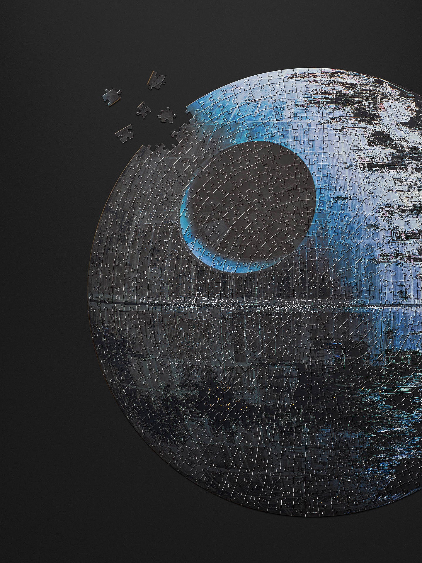 If you’re in the mood for a real challenge (and we mean it), this one-of-a-kind round Death Star jigsaw puzzle from Disney Star Wars is sure to stump even the most experienced puzzlers. 