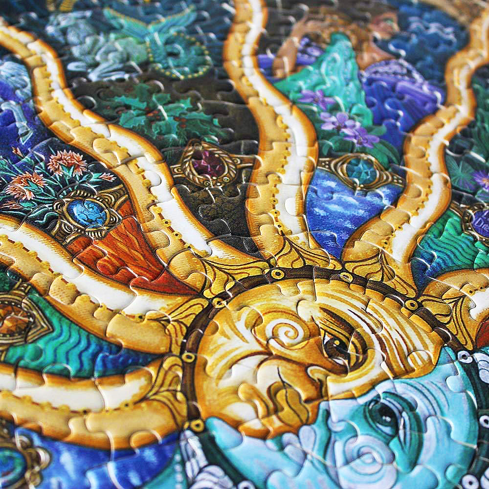 A 500-piece round puzzle to spotlight the 12 signs of the Zodiac — and I'm really not sure what could be more beautiful!