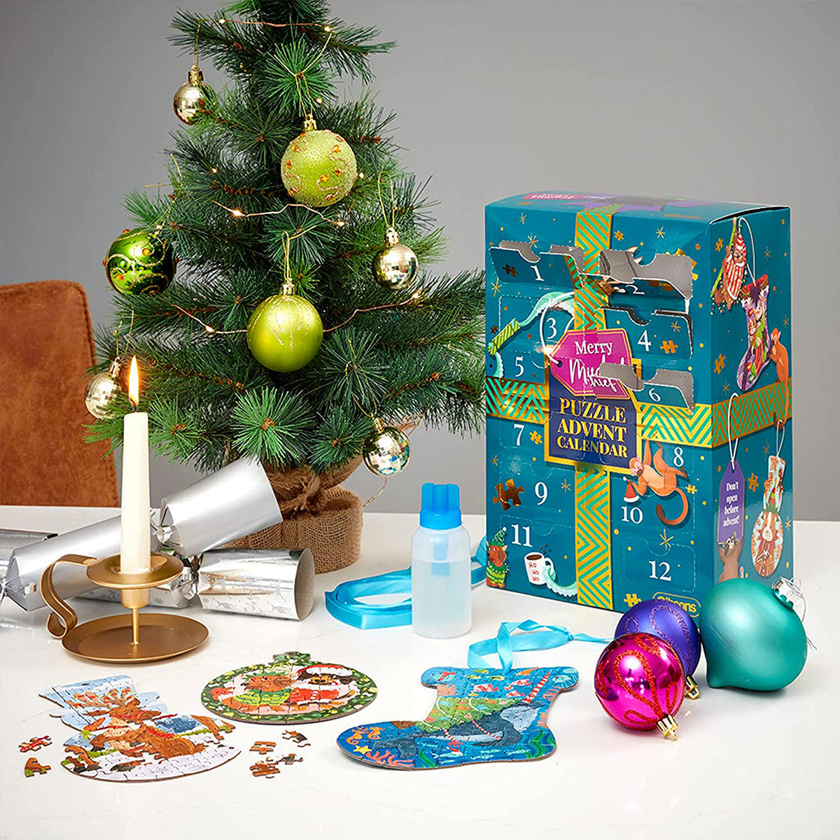 High quality –  24 door Christmas premium jigsaw puzzle advent calendar illustrated by Jess Bretherton. 
