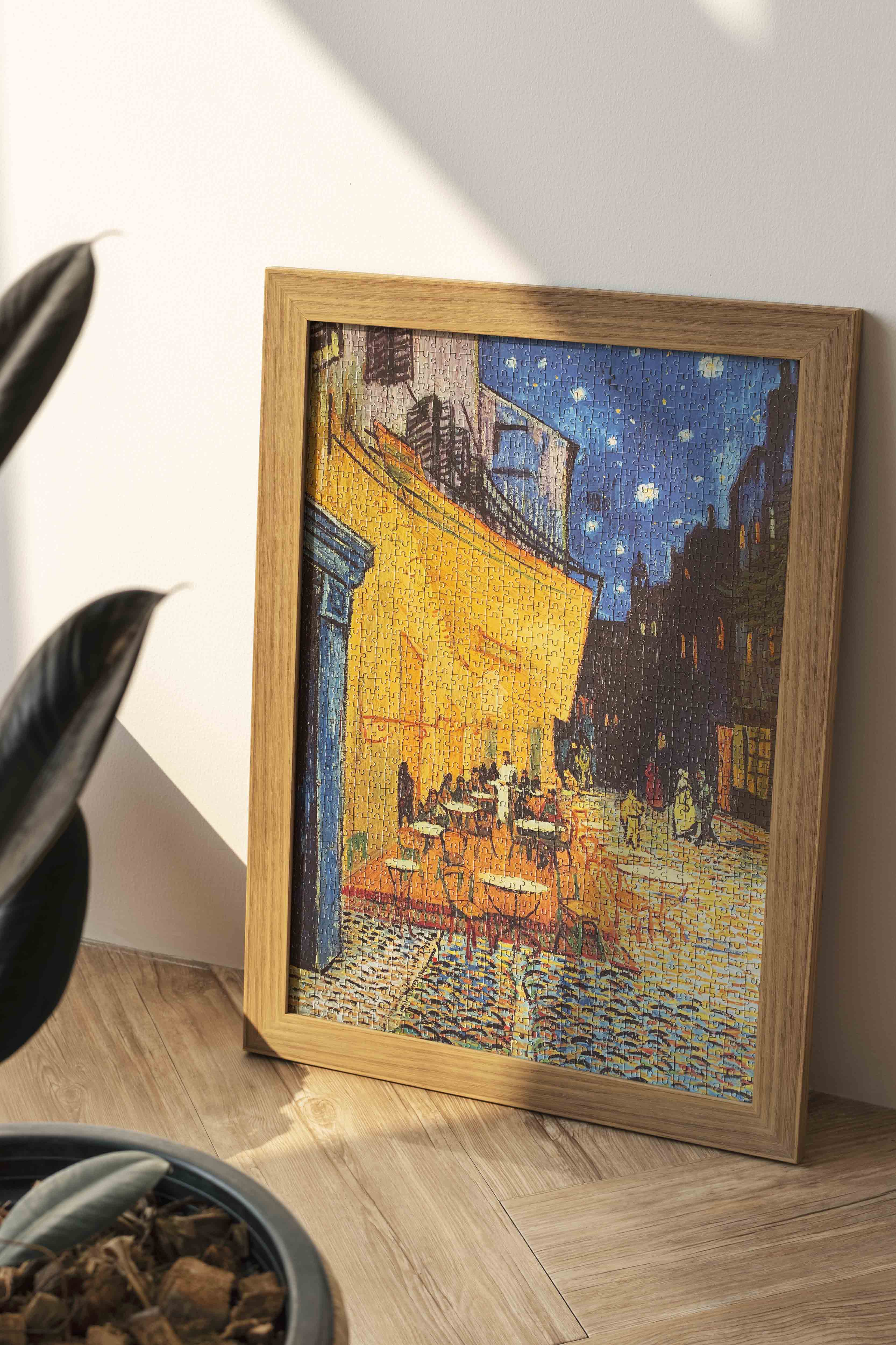 Vincent Van Gogh's Café Terrace at Night Jigsaw Puzzle: A 1000-piece puzzle of the iconic painting. Perfect for art and puzzle enthusiasts.